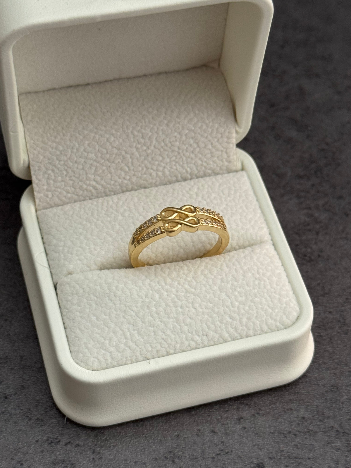 Anillo ajustable 2 hilo con doble infinito