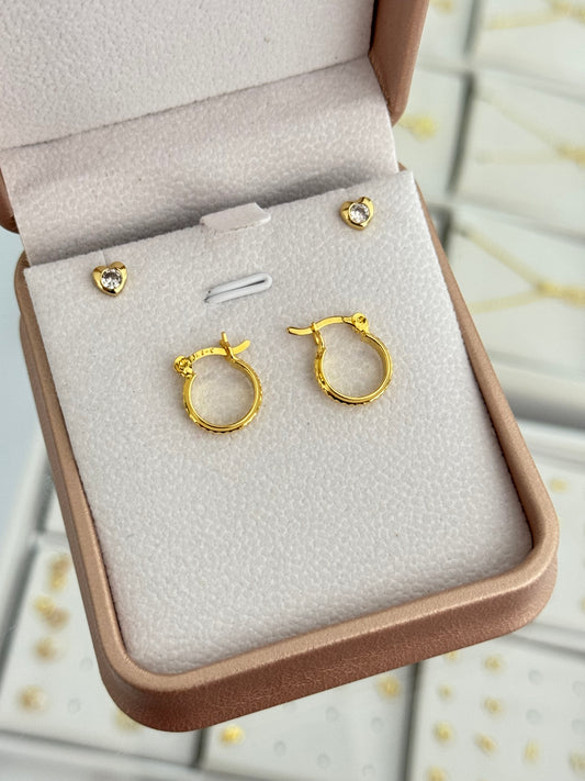 Argollas corrugadas 1.4cms + arete corazón cristal