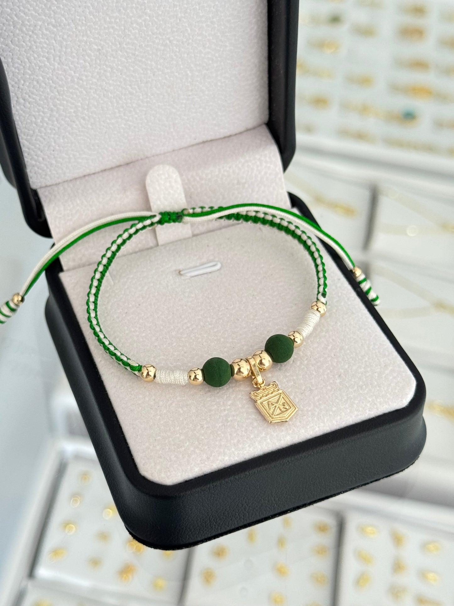Pulsera dije Nacional. N de balin: #4, #5