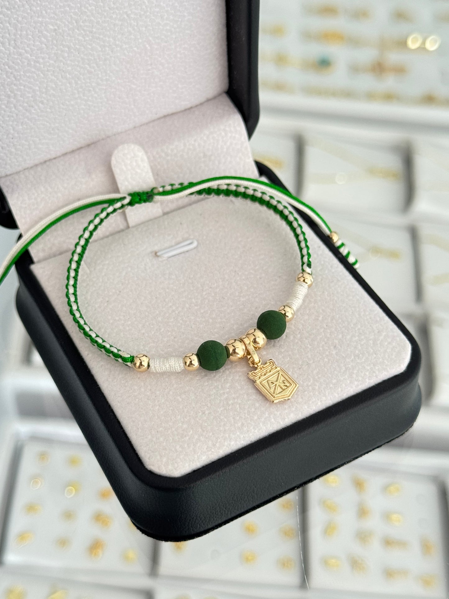 Pulsera dije Nacional. N de balin: #4, #5