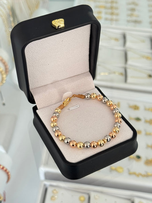 Pulsera balín #6 con broche pico de loro