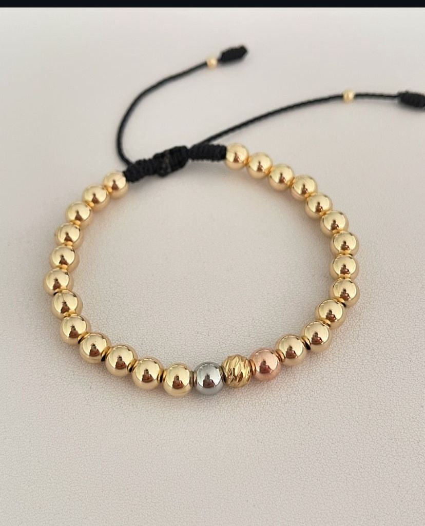 Pulsera con balines #5 tres oros.
