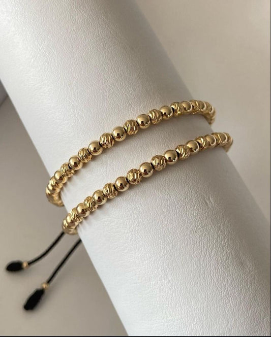 Juego pulsera con balines lisos y diamantados #4. X2